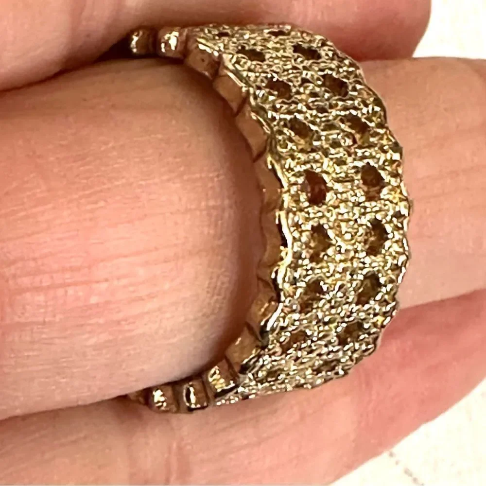 Gold tone band ring gold tone